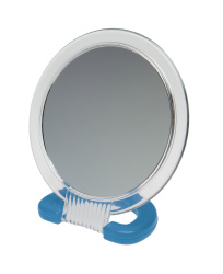 Зеркало Dewal Beauty настольное, в прозрачной оправе, на пл.подставке синего цвета,230x154 мм.